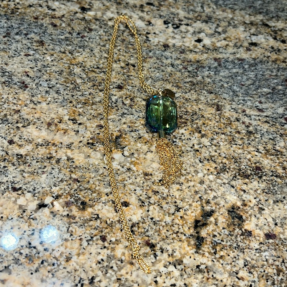 Bourbon and bowties, long gold necklace with iridescent stone